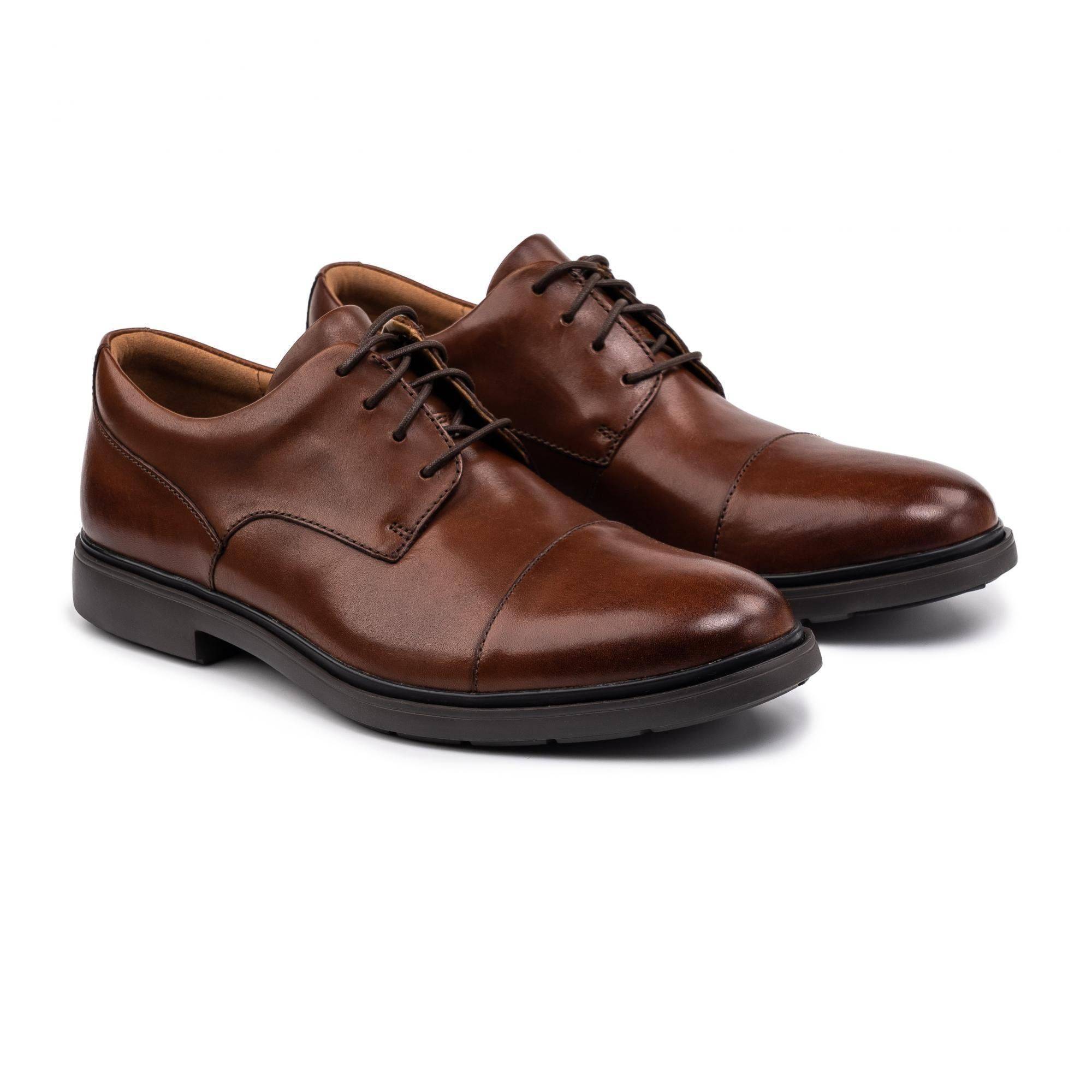 un tailor cap tan leather